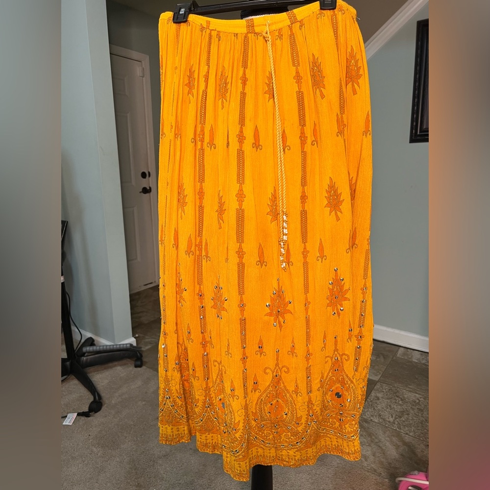 Beautiful yellow/orange skirt with studs size large
